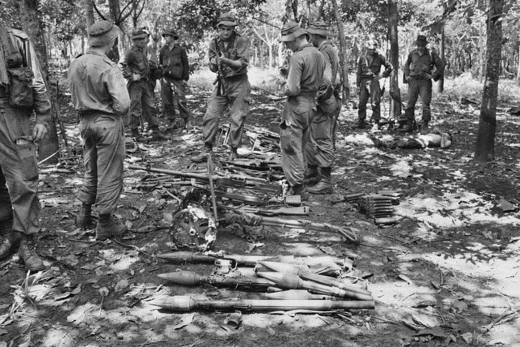 Australian troops with weapons at Long Tan in 1966