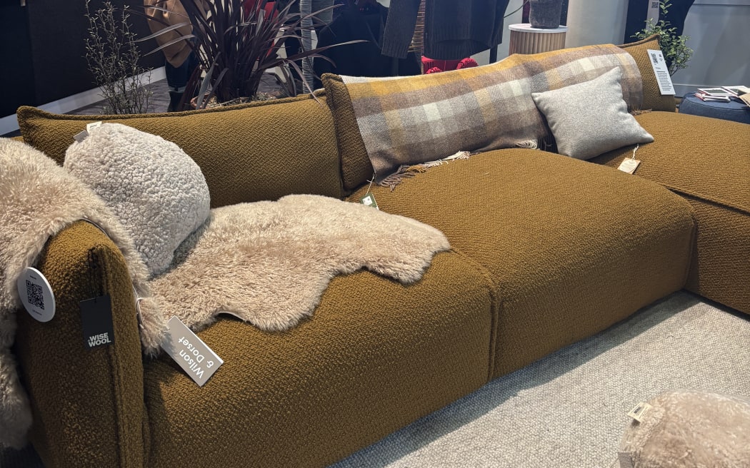 A wool couch decorated with woollen blankets, pillows and throws was the centre piece of the booth showcasing all things wool at Fieldays.