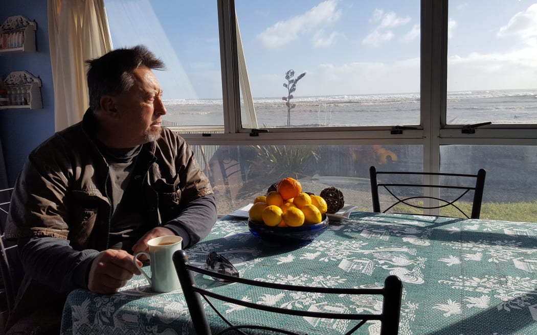 David Zimmerman of East Beach wants a seawall built to keep the local homes from being washed away.