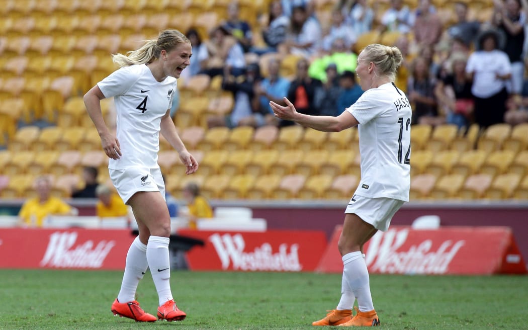 New Zealand's CJ Bott, left, celebrates with Besty Hassett.