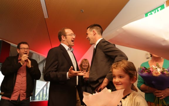 New Wellington mayor Justin Lester, who ran on a Labour Party ticket, is greeted at his victory party by Labour leader Andrew Little.