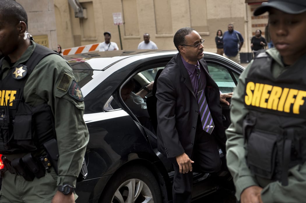 Baltimore Police Officer Caesar Goodson Jr. arrives for his murder trial in the death of Freddie Gray, at the Baltimore Circuit Court House on June 23, 2016 in Baltimore.