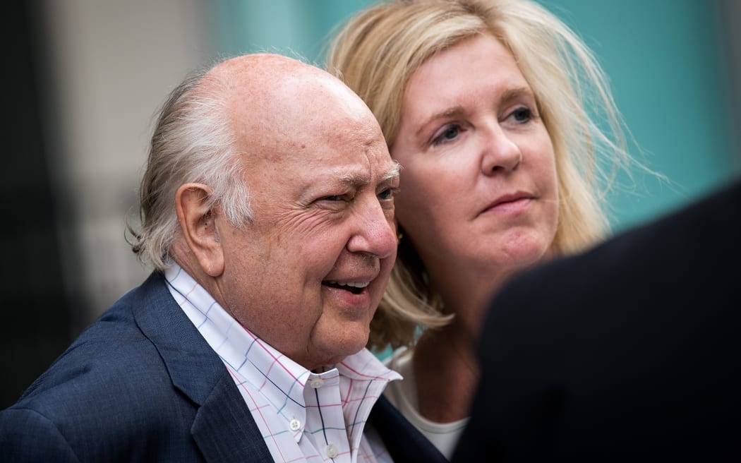 Roger Ailes, at left, with wife Elizabeth Tilson leaving  the News Corp building in New York, 19 July 2016.