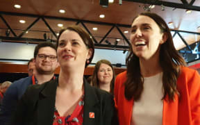Claire Szabo (left) and Prime Minister Jacinda Ardern.