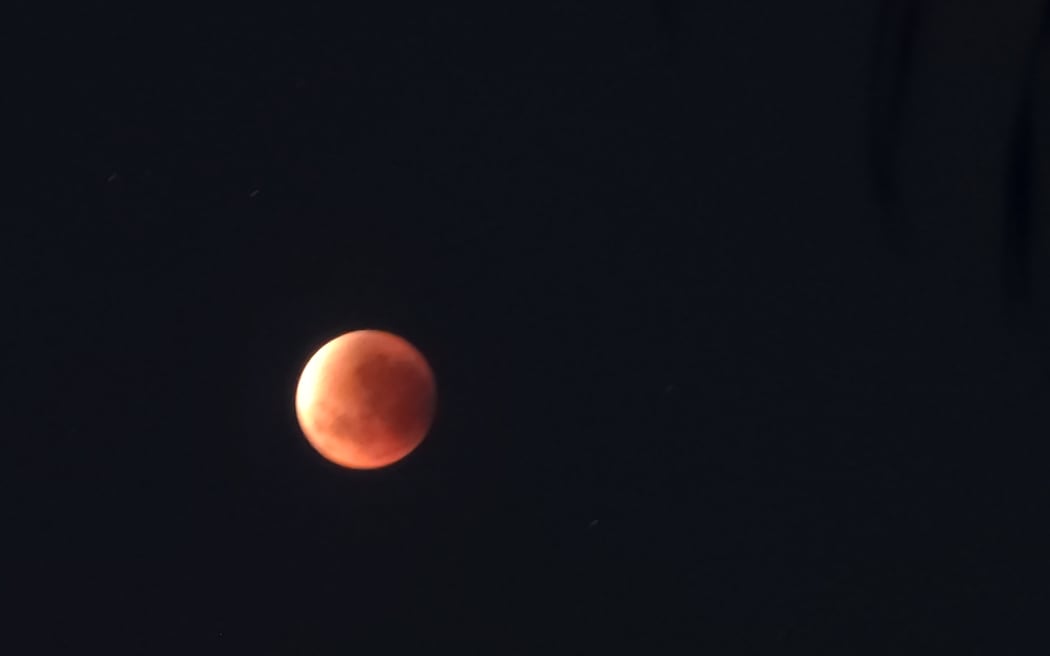 The lunar eclipse / blood moon as seen from Tairua.