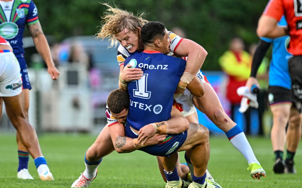 Roger Tuivasa-Sheck of the Warriors is tackled. New Zealand Warriors v Newcastle Knights, round 4 of the 2024 NRL Premiership at Go Media Stadium, Mt Smart, Auckland, New Zealand on Sunday 31 March 2024. Photo by Andrew Cornaga / www.photosport.nz