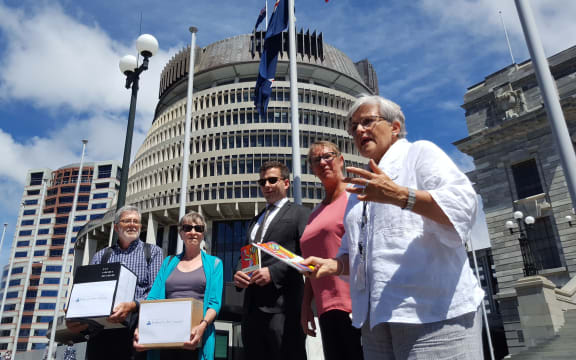 Maryan Street speaking as books are delivered to David Seymour and Ruth Dyson.