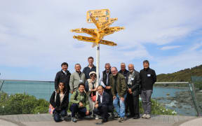 A delegation from Kumagaya, Japan, visited Invercargill in 2025. The iconic Kumagaya signpost can be seen at Stirling Point in the port town of Bluff.