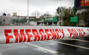 Cordons outside Countdown on Cumberland Street, Dunedin after a stabbing.