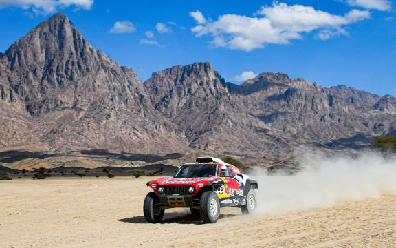 Carlos Sainz competes in Dakar Rally.