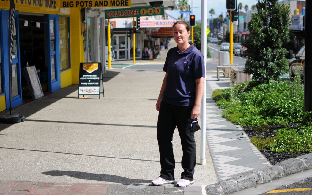 Ōtāhuhu Business Association manager Richette Rodger standing on Great South Rd near the intersection with Mason Ave where the work on the upgrade project stopped two years ago.