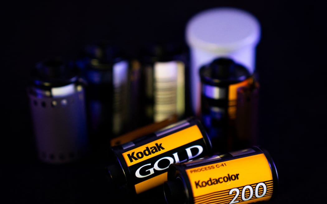 Two film rolls with the Kodak logo are in front of other photography film rolls. (Photo by Nikos Pekiaridis/NurPhoto) (Photo by Nikos Pekiaridis / NurPhoto via AFP)