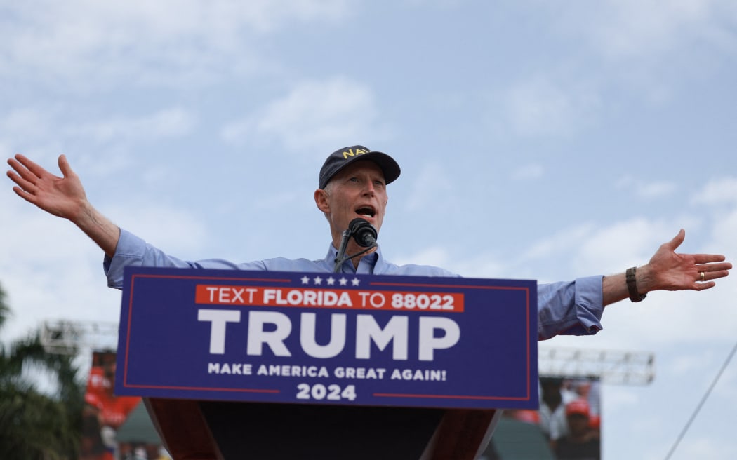 DORAL, FLORIDA - JULY 09: Sen. Rick Scott (R-FL) attends a campaign rally for former President Donald Trump at the Trump National Doral Golf Club on July 09, 2024 in Doral, Florida. Trump continues to campaign ahead of the Republican National Convention which starts on July 15.   Joe Raedle/Getty Images/AFP (Photo by JOE RAEDLE / GETTY IMAGES NORTH AMERICA / Getty Images via AFP)