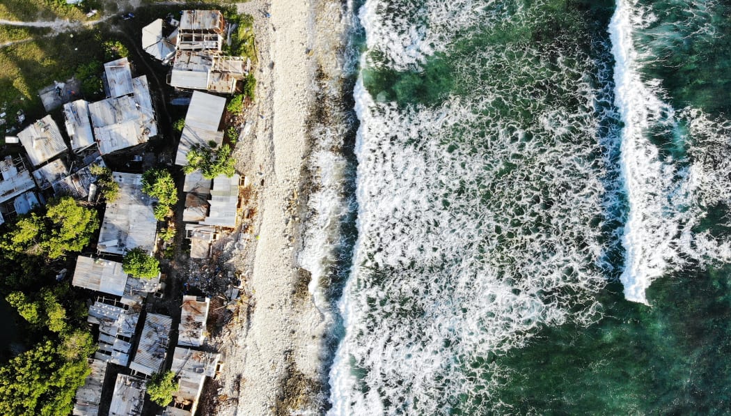 An aerial view of homes next to the Pacific Ocean on 28 November, 2019 in Funafuti, Tuvalu.