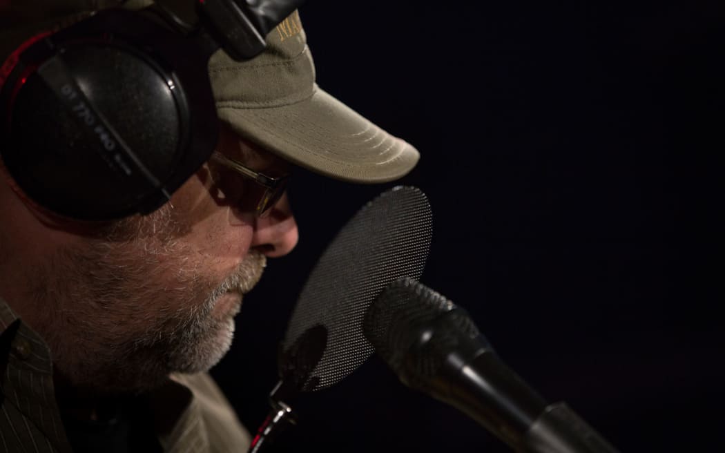 Musician and artsist Robert Scott in RNZ Auckland Studio B playing 'Little Bird'. 2 November 2018.