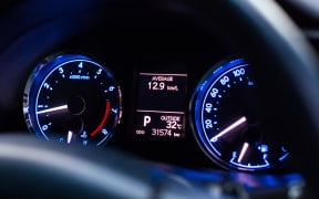 speedometer car mileage close up car temperature