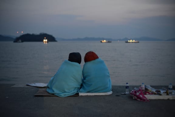 Relatives have gathered at Jindo Island near the site of the sinking.