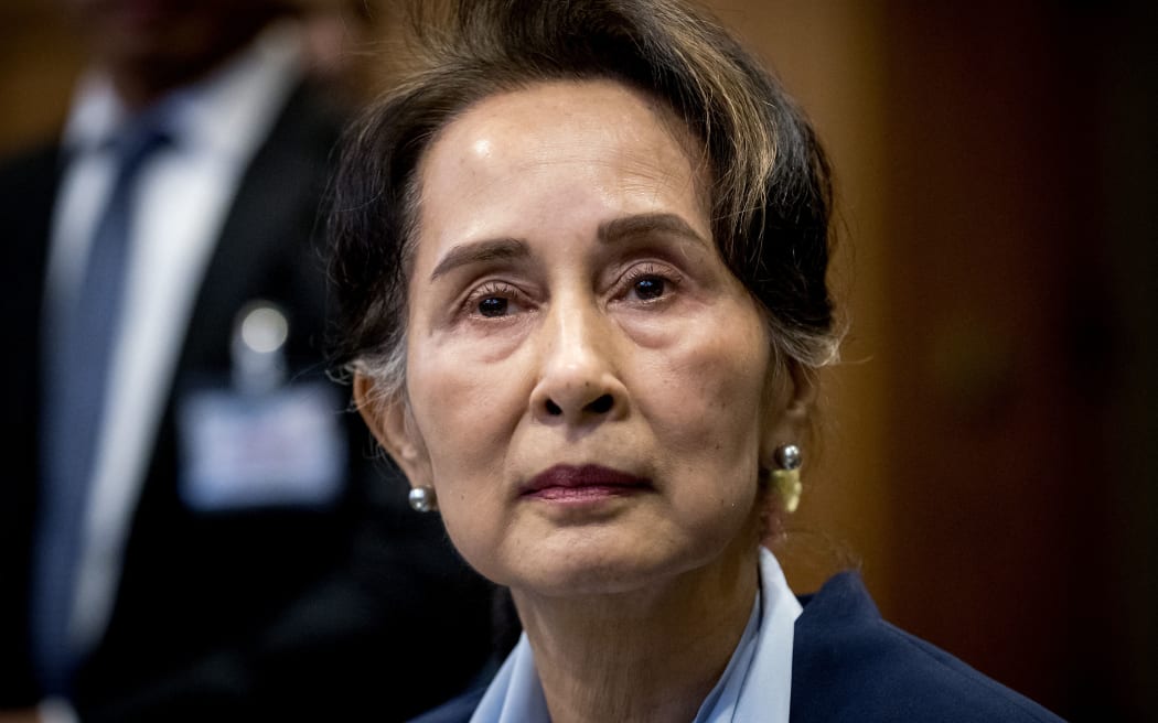 (FILES) In this file photo taken on December 11, 2019, then Myanmar's State Counsellor Aung San Suu Kyi looks on before the UN's International Court of Justice in the Peace Palace of The Hague, on the second day of her hearing on the Rohingya genocide case. - A Myanmar junta court sentenced ousted leader Aung San Suu Kyi to three years in jail for electoral fraud, a source with knowledge of the case said September 2, 2022. Suu Kyi was "sentenced to three years imprisonment with hard labour", the source said, adding that the Nobel laureate, 77, appeared to be in good health.