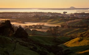 The Western Bay of Plenty town of Katikati is just two and a half hours drive from Auckland - but here $650,000 can buy you a four bedroom home with a garden.