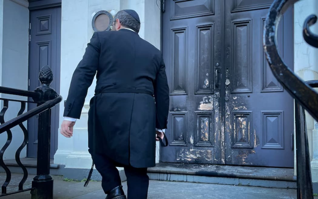 Police say about 20 people were inside the synagogue when the attack happened but all escaped without injury.