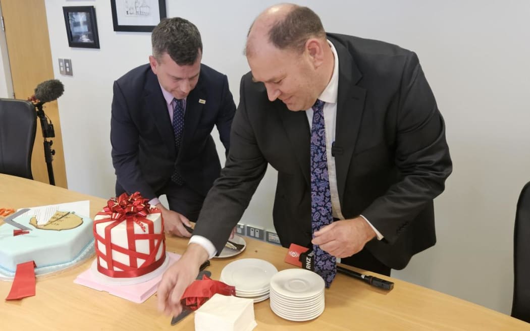 Ministers David Seymour and Andrew Hoggard cut cakes and red tape at Parliament.