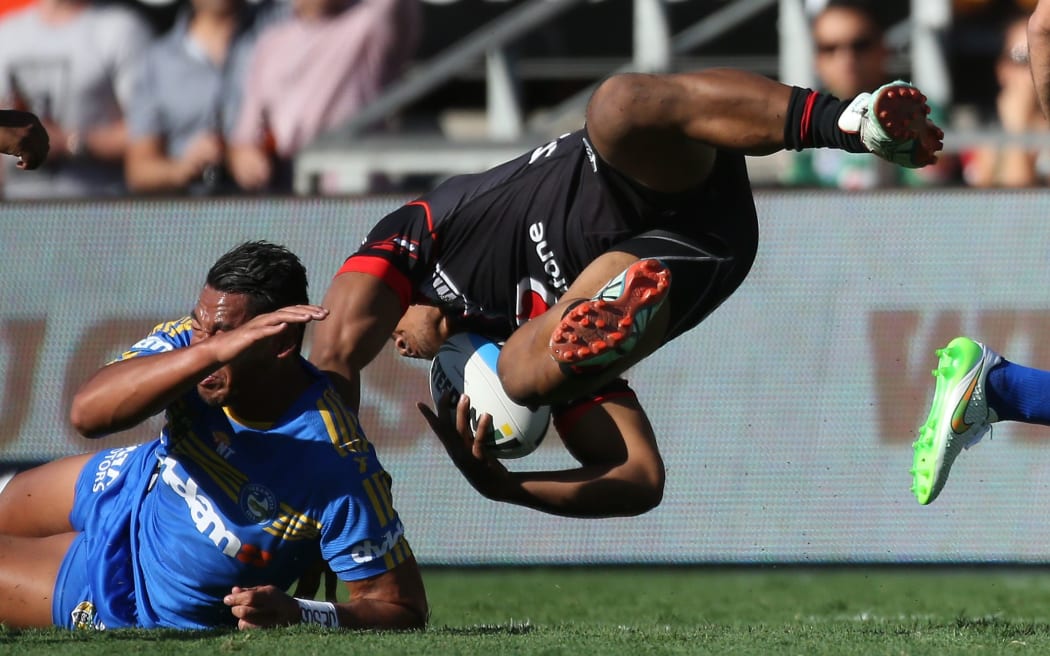 Warriors rookie Solomone Kata takes to the air against the Eels
