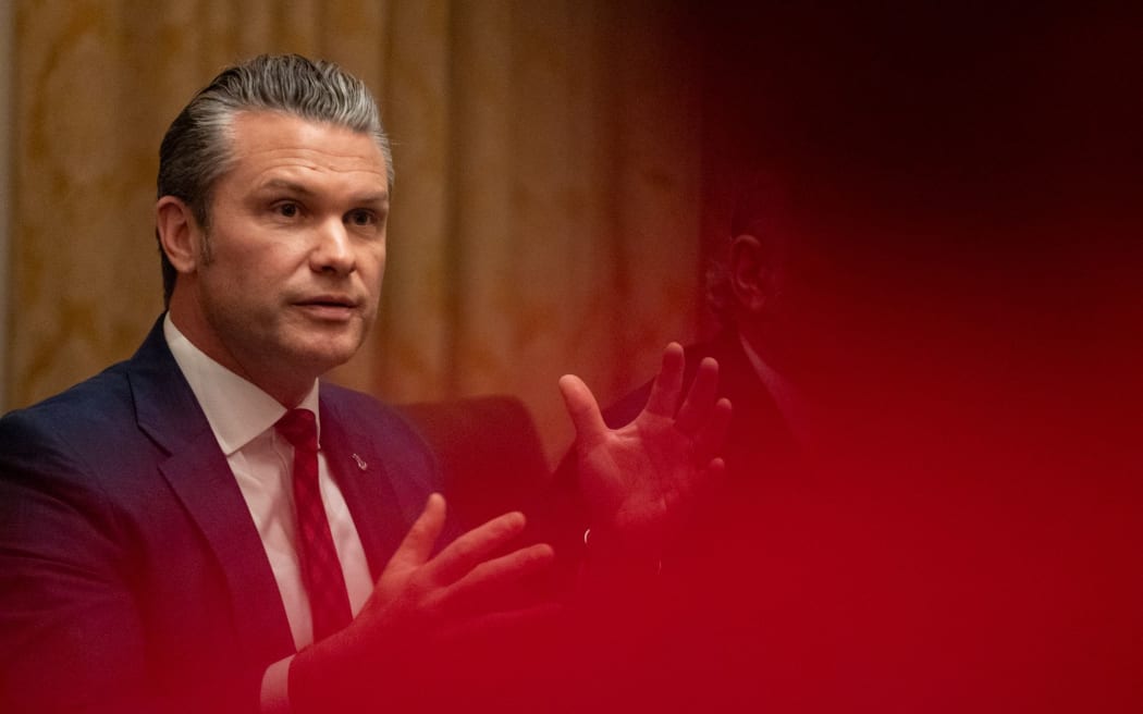 Defence Secretary Pete Hegseth speaks in front of President Donald Trump during a cabinet meeting at the White House in Washington, DC on 2 December, 2025.