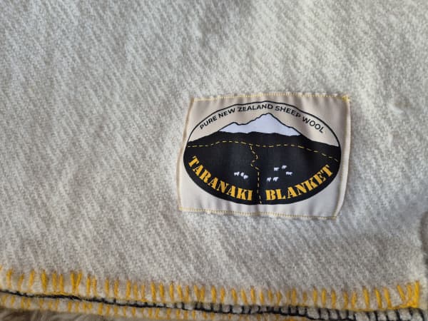 The blankets are made in the colour of the local Taranaki Bulls team.