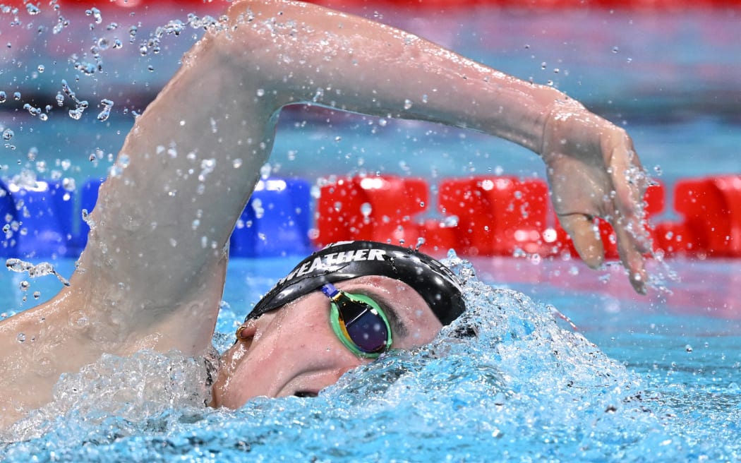 New Zealand's Erika Fairweather competes in the final of the women's 400m freestyle swimming event at the Paris 2024 Olympic Games at the Paris La Defense Arena in Nanterre, west of Paris, on July 27, 2024. (Photo by SEBASTIEN BOZON / AFP)