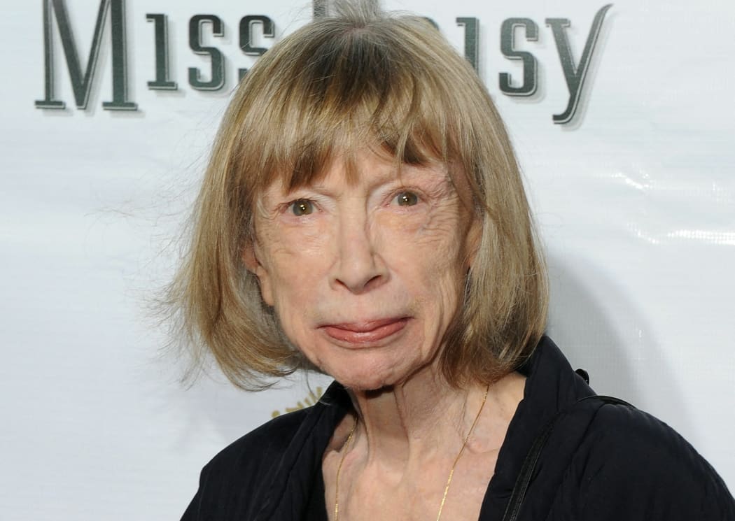 Author Joan Didion, a US literary icon credited with ushering in "new journalism" with her essays on Los Angeles life in the tumultuous 1960s, died at 87.