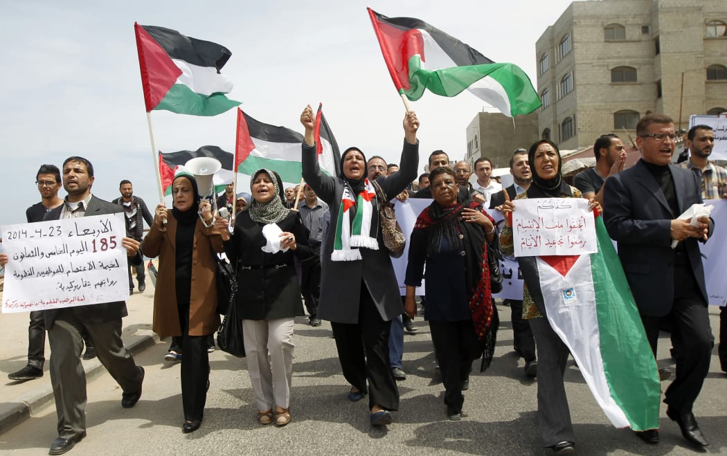 Palestinians demonstrate in the Gaza Strip in support of the new attempt at reconciliation