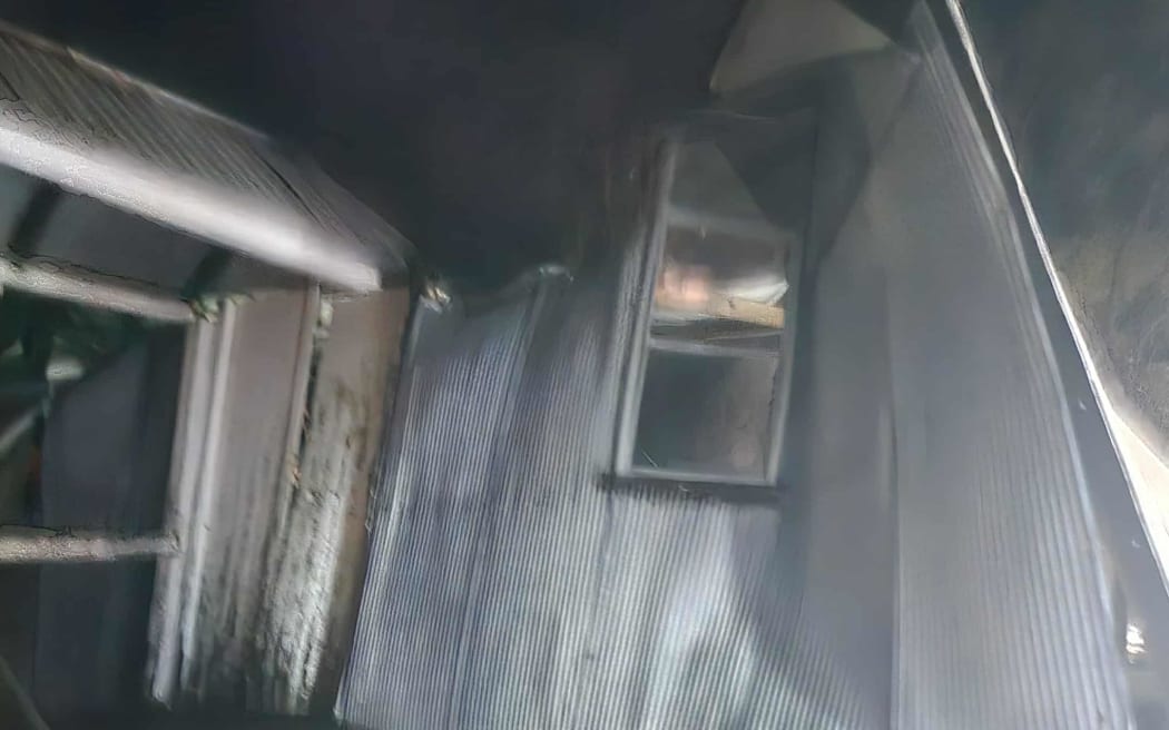 Some wedding guests fought to keep the walls up as children took shelter.