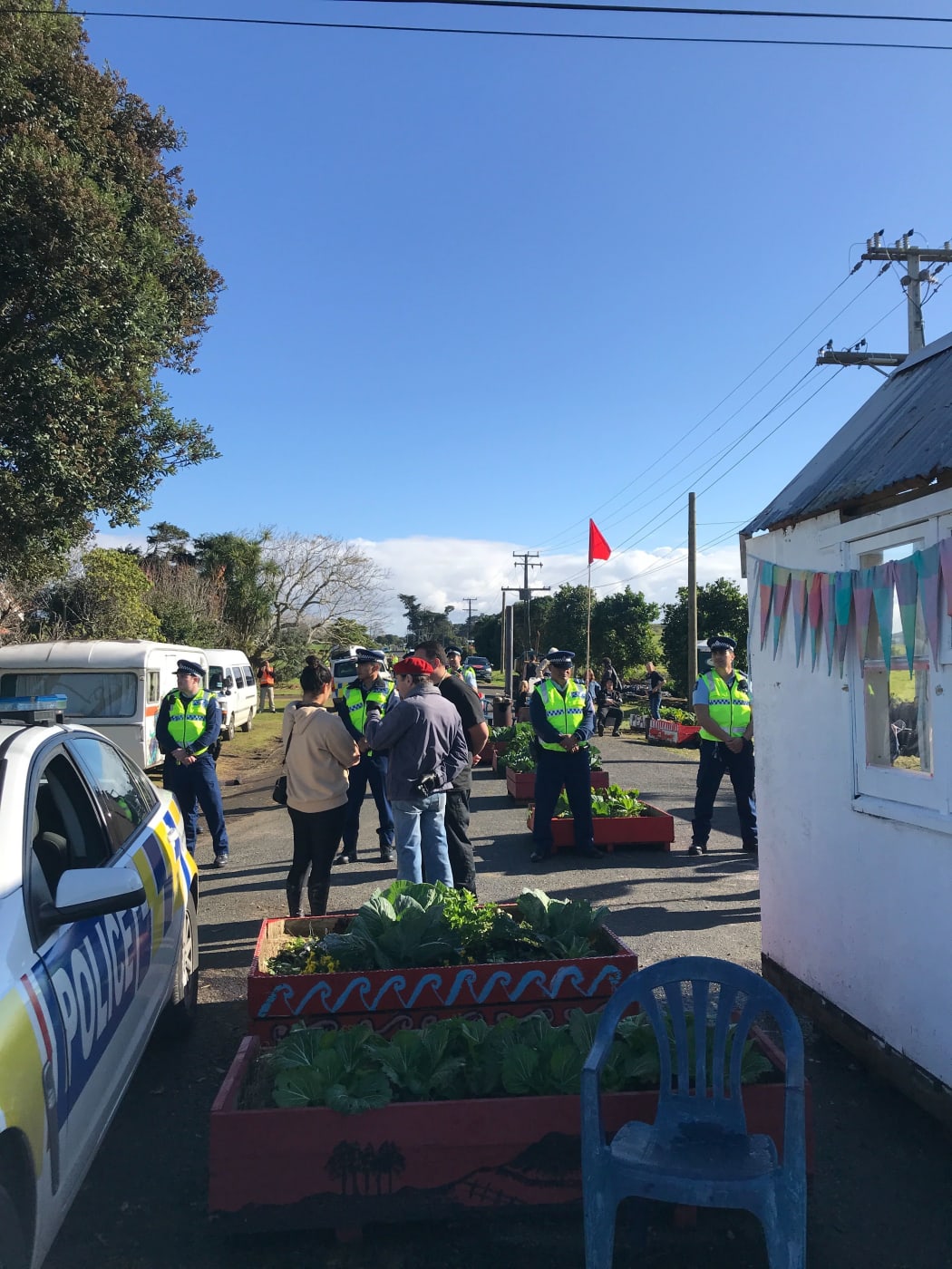 Police at Ihumātao to serve an eviction notice by a bailiff against people who have been occupying the site.