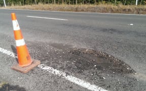 The storm has left region's roads littered with potholes.