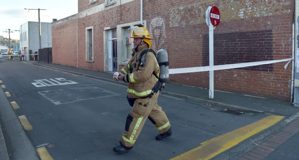 Firefighters and a hazmat command vehicle have descended on a South Dunedin building after an incident involving an unstable chemical.