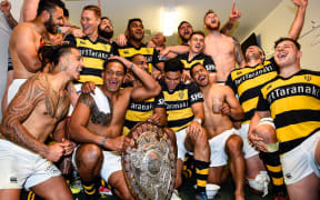 Taranaki celebrate with the Ranfurly Shield.