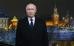 In this video grab distributed by the Russian state agency Sputnik on December 31, 2024, Russia's President Vladimir Putin delivers his New Year's address to the nation at the Kremlin in Moscow. (Photo by POOL / AFP)