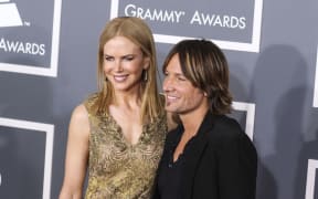 (FILE) Nicole Kidman and Keith Urban split after 19 years of marriage on Monday, September 29, 2025. LOS ANGELES, CALIFORNIA, USA - FEBRUARY 10: Australian-American actress and producer Nicole Kidman and husband/Australian-American country music singer, guitarist, and songwriter Keith Urban arrive at the 55th Annual GRAMMY Awards held at Staples Center on February 10, 2013 in Los Angeles, California, United States. (Photo by Xavier Collin/Image Press Agency/NurPhoto) (Photo by Image Press Agency / NurPhoto via AFP)