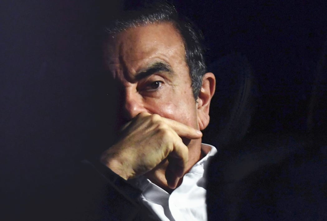 Carlos Ghosn leaves the attorney office in Chiyoda Ward, Tokyo on March 6, 2019.
