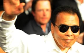 Boxing legend Muhammad Ali salutes the crowd before the start of the Floyd Mayweather Jr. and Shane Mosley welterweight fight at the MGM Grand Garden Arena on May 1, 2010 in Las Vegas, Nevada.