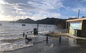 Lake Rotomā is so full, the water is lapping around the public toilets.