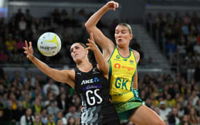 Silver Fern Amelia Walmsley and Australia's Courtney Bruce battle for possession in the opening Constellation Cup netball test in Melbourne.