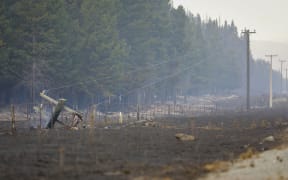 The charred remains of the fire that swept through the countryside near Lake Pukaki. 31 August 2020.