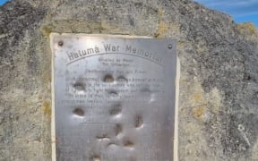 A close-up of the damaged plaque at Hātuma War Memorial in Hawke's Bay.