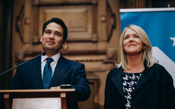 Simon Bridges and his wife Natalie as he gives a speech after being replaced as leader of the National Party.