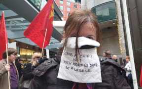 A protester outside SkyCity.
