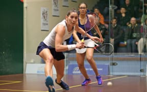 Joelle King in white top competing at the Hong Kong Squash Open 2018