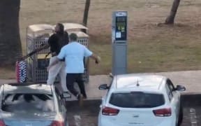 Ahmed Al Ahmed wrestled a gun from one of the shooters.