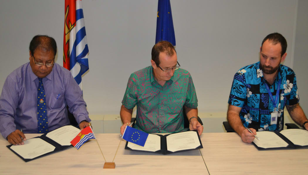 Kiribati Minister, Teuea Toatu; EU Ambassador to the Pacific, Andrew Jacobs and General Manager, NETCON representative Luke van Zeller.
