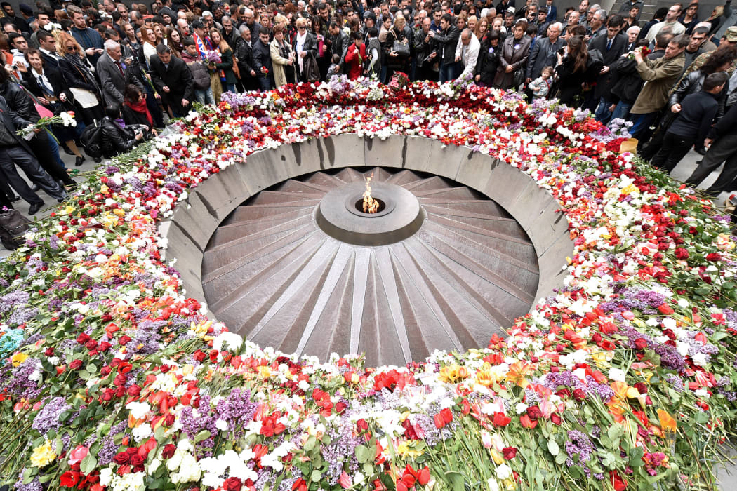 People lay flowers at the Tsitsernakaberd Memorial in Yerevan.